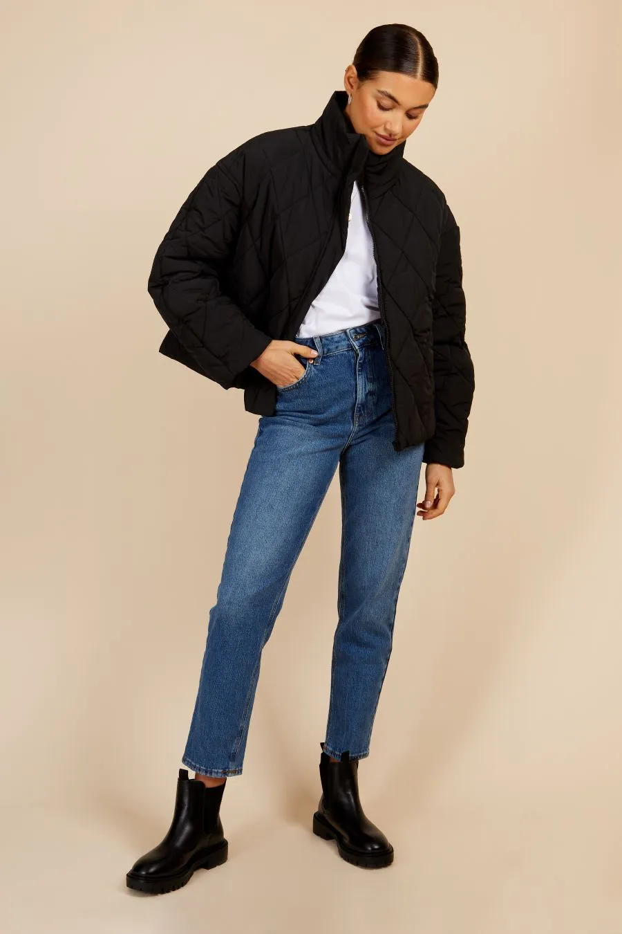 Black Quilted Puffer Jacket by Vogue Williams