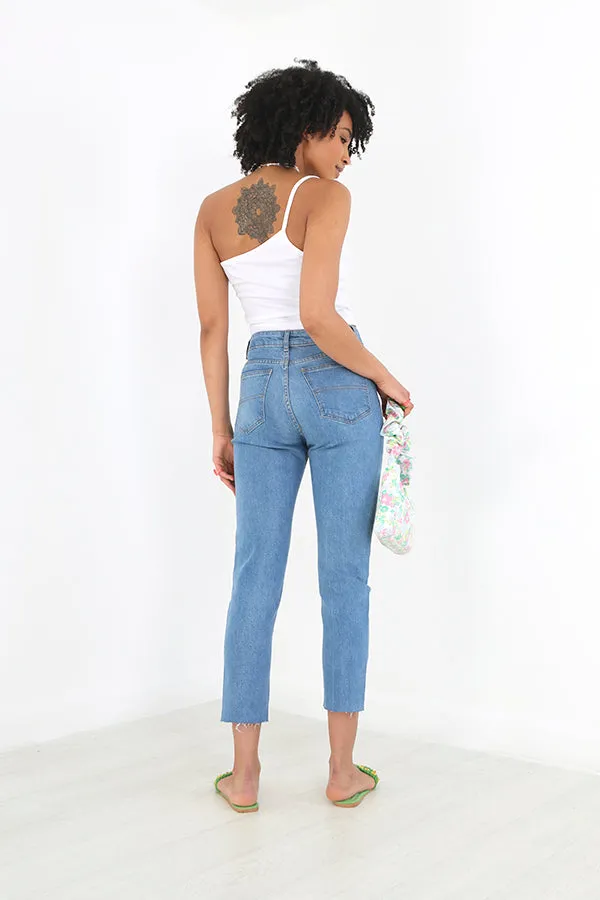 PALE BLUE DENIM RAW HEM MOM JEANS