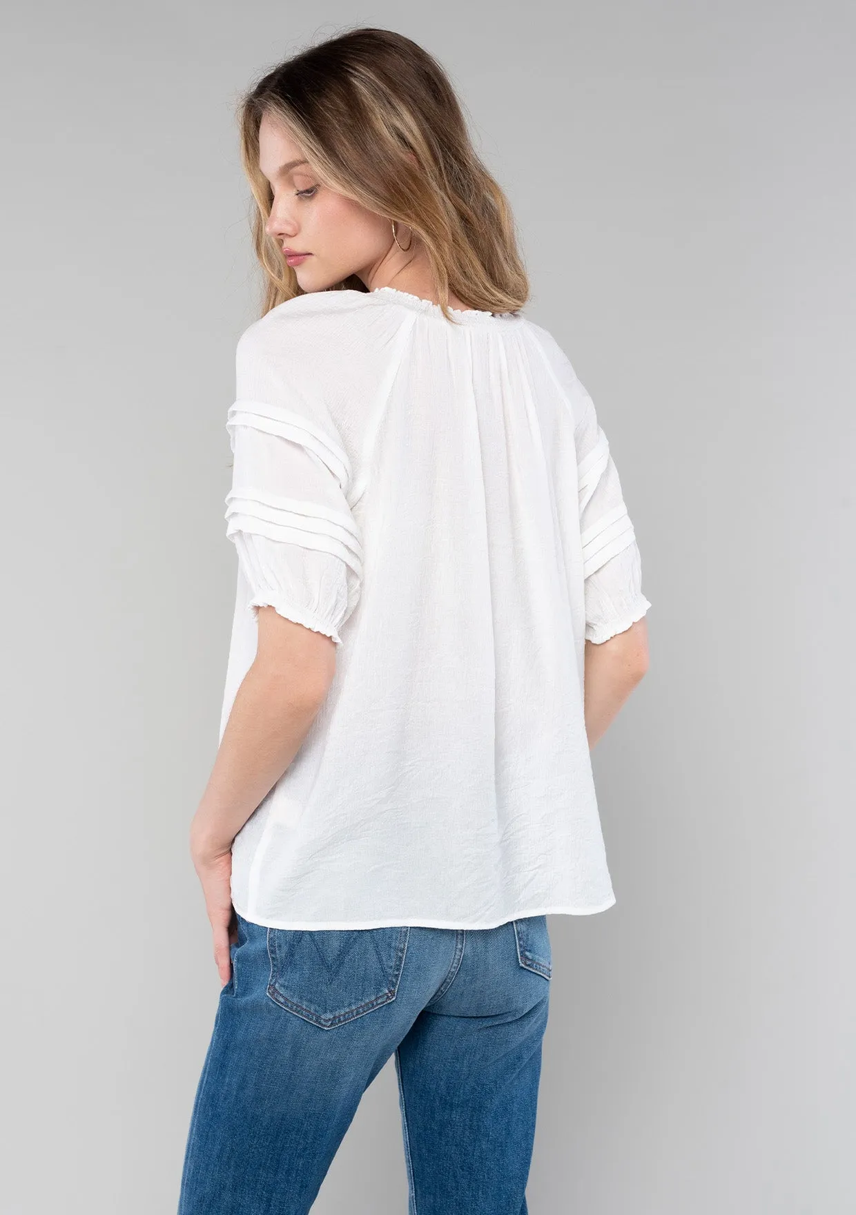 Ruffled Puff Sleeve Tassel Tie Neck Blouse